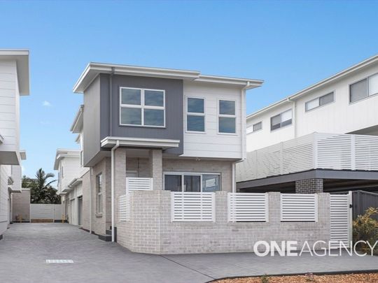 LOW MAINTENANCE LIFESTYLE IN A DESIRABLE LOCATION - Photo 1