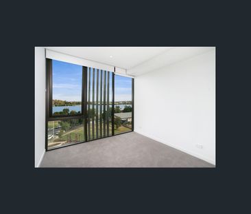 Modern 2 Bedroom + MPR Apartment with River Views in Riverlight East - Photo 5