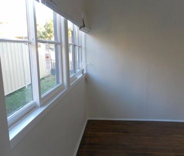 RENOVATED AND WELL LOCATED HOME - Photo 1