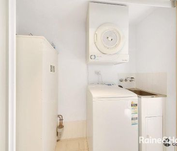 Furnished Spacious Coastal Apartment Living with Pool & Water Views - Photo 3