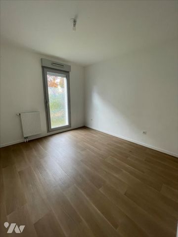 Résidence récente - F2 en RDC avec terrasse et parking - Photo 2