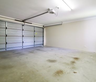 Stylish, Spacious, and Set to Impress - Welcome to 28 Liriope Drive! - Photo 5