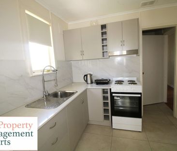 Tidy & Spacious 4-Bedroom Family Home in Miller - Photo 5