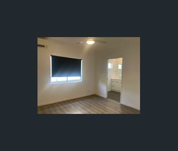 Modern 4-Bedroom Home with Secure Yard - Deagon - Photo 5