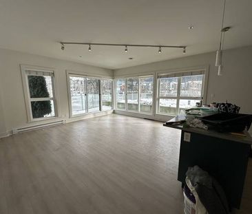 Ground floor waterfront two bedroom + den unit at Mistral (102) - Photo 3