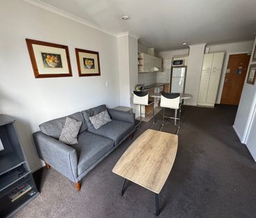 Cozy 1-Bedroom Studio with Covered Garage parking - Photo 4