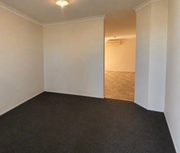 Neat 4-bedroom Home with Monthly Lawn Mowing included - Photo 3