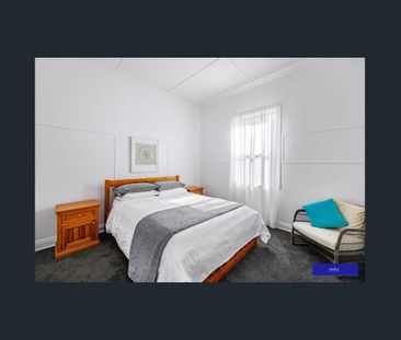 PLENTY OF CHARM IN THIS INNER-CITY ABODE - Photo 1