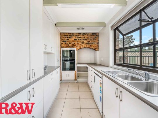 LARGE HOME WITH A POOL !! - Photo 1