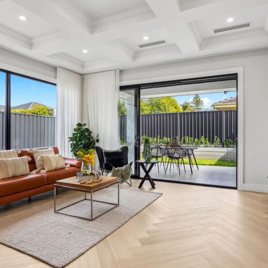 Brand New Beach Side Bliss with Four Bedrooms and Three Bathrooms - Photo 1