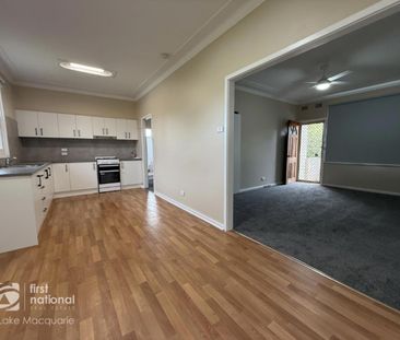 Stylish Renovated Home with Entertaining Deck & Huge Backyard - Photo 1