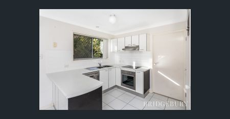 Two storey living with a pool in the complex! - Photo 4