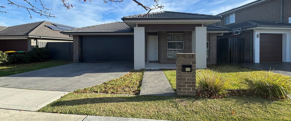 LOW MAINTENANCE FAMILY HOME! - Photo 1