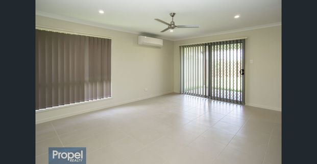 Modern 4 bedroom home in Riverbank estate - Photo 1