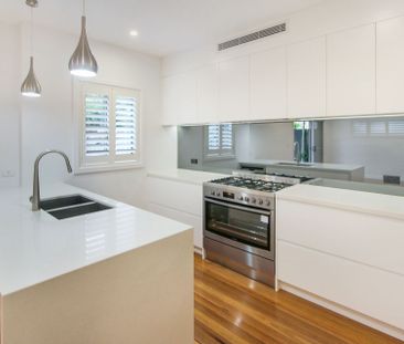 Stylish 2 Sorey 5 Bedroom Home in Convenient Location - Photo 6