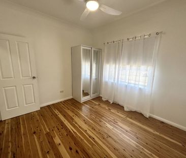 Spacious Family Home with Large Shed - Photo 4