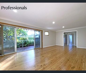 Comfortable Family Living in a Convenient Location! - Photo 1