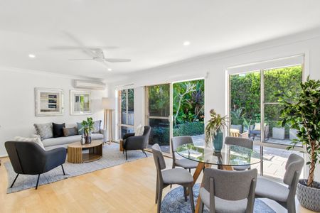PEACEFUL SINGLE LEVEL LIVING IN A LEAFY SETTING - Photo 2