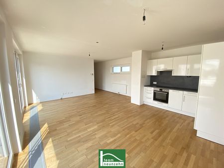 Tolle Neubauwohnung mit großer Fensterfront und Terrasse! – in 6 Min. zum Bahnhof Floridsdorf – inkl. Einbauküche und top Ausstattung! - Photo 3