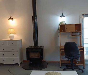 Sunny and Spacious 4-Bedroom, 2-Bathroom Home - Photo 1