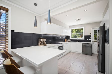 Contemporary Family Home with Poolside Entertaining & Leafy Outlooks - Photo 4