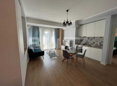 Apartament modern, 3 camere, 70 mp, decomandat, zona ultracentrală - Fotografie 2