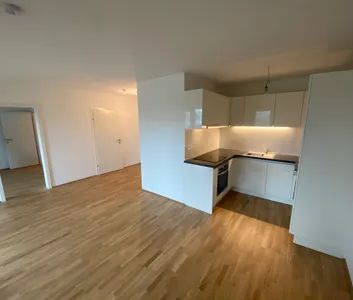 48 m2 plus Balkon & mit hochwertiger Tischlerküche - nur 5 Gehminuten zu U1 Oberlaa - Foto 1