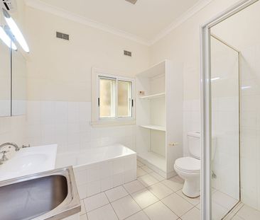 Recently Refreshed Two-Bedroom Home in Ultra-Convenient Setting - Photo 6