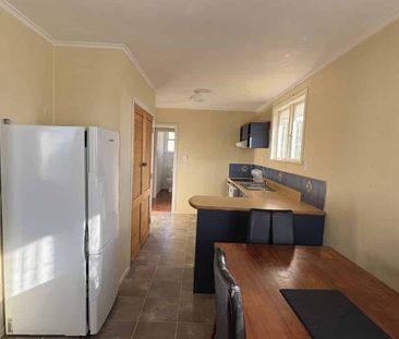 Tidy 3-Bedroom Home with Great Indoor-Outdoor Flow - Photo 1