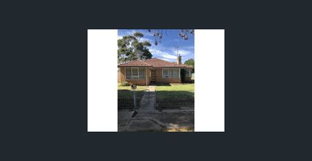 Neat & Modern 3-Bedroom Home with Low Maintenance Yard - Photo 4