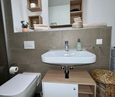 Exklusives Apartment mit Terrasse in zental gelegenem Neubau - Photo 6