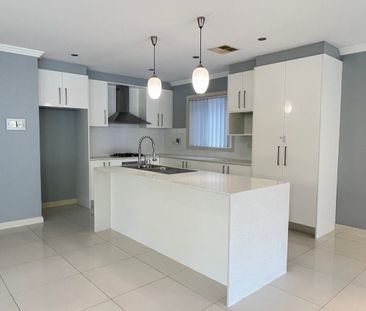 Spacious 4 bedroom family home - Photo 6