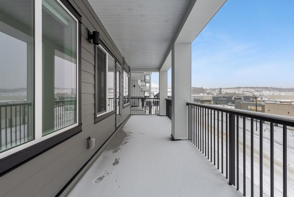 Brand New 3 Bedroom Condo In 'wolf Willow'. Next To Fish Creek Park. - Photo 1