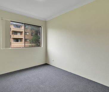 Bright 2 bedroom unit with secured lock up garage and storage - Photo 5