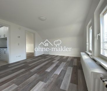 Gemütliche 2-Zimmer-Wohnung in ruhiger und zentraler Lage von Lambr... - Foto 1