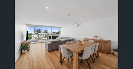 Beachfront Living with Modern Comfort - Photo 3