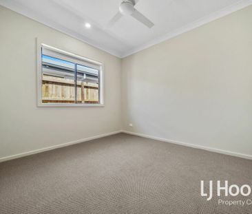 Modern Family Home with Ducted Air Conditioning & Media Room - Photo 6