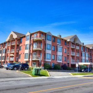 4 1/2 Condo rénové à louer près du boulevard St-Jean, dans l'ouest de l'île - Photo 2