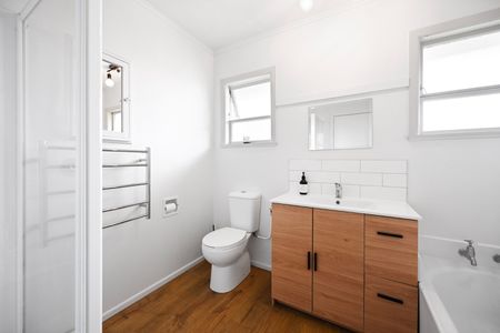 This a fantastic, neat and tidy home with a large living room with ranch slider to the front deck, dining room open to the runway kitchen, three bedrooms, full family bathroom with bath and shower, large yard with bountiful fruit trees, double carport, at the end of a quiet cul de sac. - Photo 4