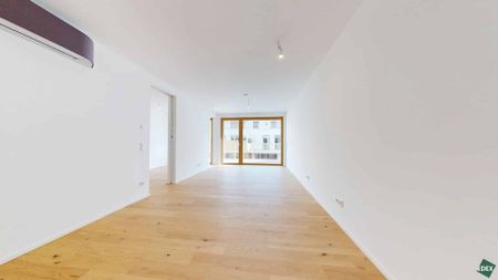 ERSTBEZUG | Klimatisierte W2-Zimmer-Wohnung mit Balkon, Garagenplatz optional - Photo 2