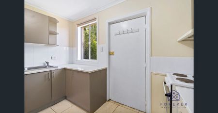 Modern Comfort Meets Convenient Living in the Heart of Daisy Hill! - Photo 5