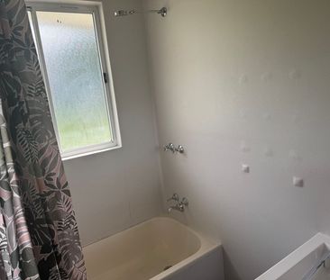 Neat Three-Bedroom Home in Prime Location - Photo 4