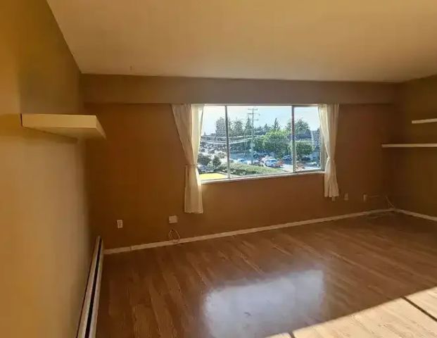 Top floor south and west facing corner-unit, spacious 2 Bedroom / 1 Bathroom apartment with outdoor pool $1,790 (Delta), 920 sqft | 11806 88 Avenue, Delta - Photo 1