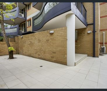 AFFORDABLE TWO BEDROOM EXECUTIVE LIVING IN THE CONVENIENT LOCATION - Photo 3