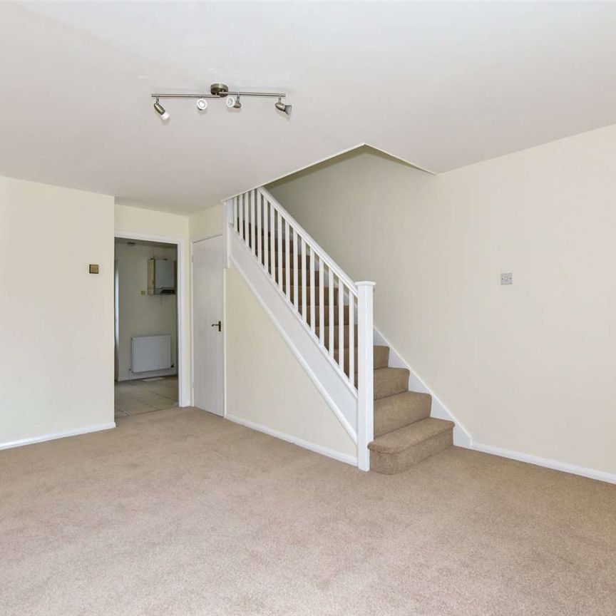 A two bedroom semi-detached home with garage and off street parking - Photo 1