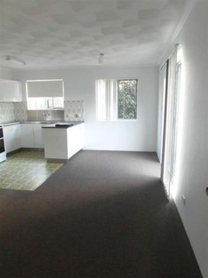 Ground Floor Two Bedroom Unit - Walk to Water - Photo 1