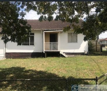 Freshly Painted Family Home with Spacious Backyard - Photo 2