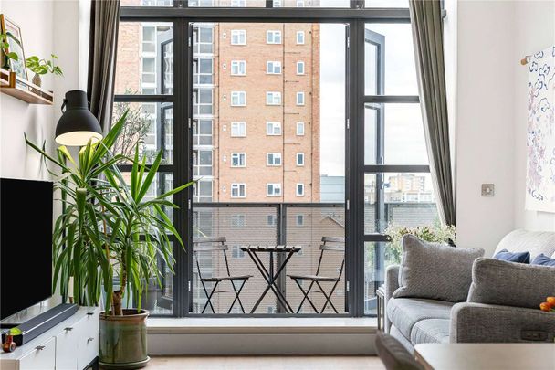 Two-bedroom, two-bathroom loft-style apartment set within a modern warehouse conversion in the heart of Hackney, with skyline views and a private balcony. - Photo 1