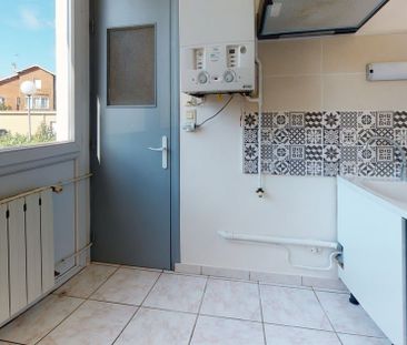 Location Appartement 4 pièces 69m² ROMANS SUR ISERE 26100 - Photo 1