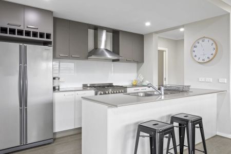 Spacious Family Home with Modern Comforts, Corner Block, and Easy Freeway Access - Photo 5